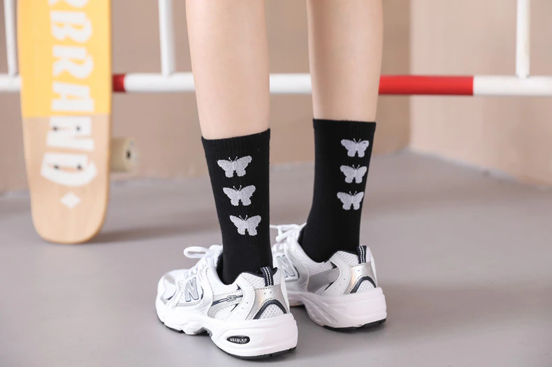 back showing butterflies crew socks